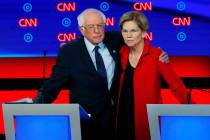 In a July 30, 2019, file photo, Sen. Bernie Sanders, I-Vt., and Sen. Elizabeth Warren, D-Mass., ...