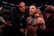 Conor McGregor leaves the octagon after his loss to Khabib Nurmagomedov in their lightweight ti ...