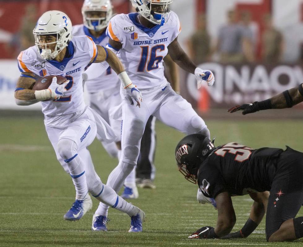Boise State Broncos wide receiver Khalil Shakir (2) breaks free of UNLV Rebels linebacker Jacob ...