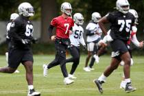 Oakland Raiders quarterback Mike Glennon attends a training session during the media day at The ...