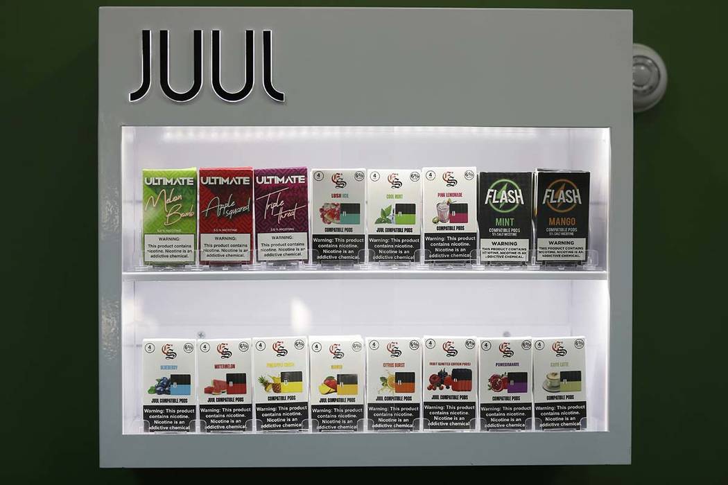 FILE - In this Sept. 3, 2019, file photo, electronic cigarette pods are displayed for sale at a ...