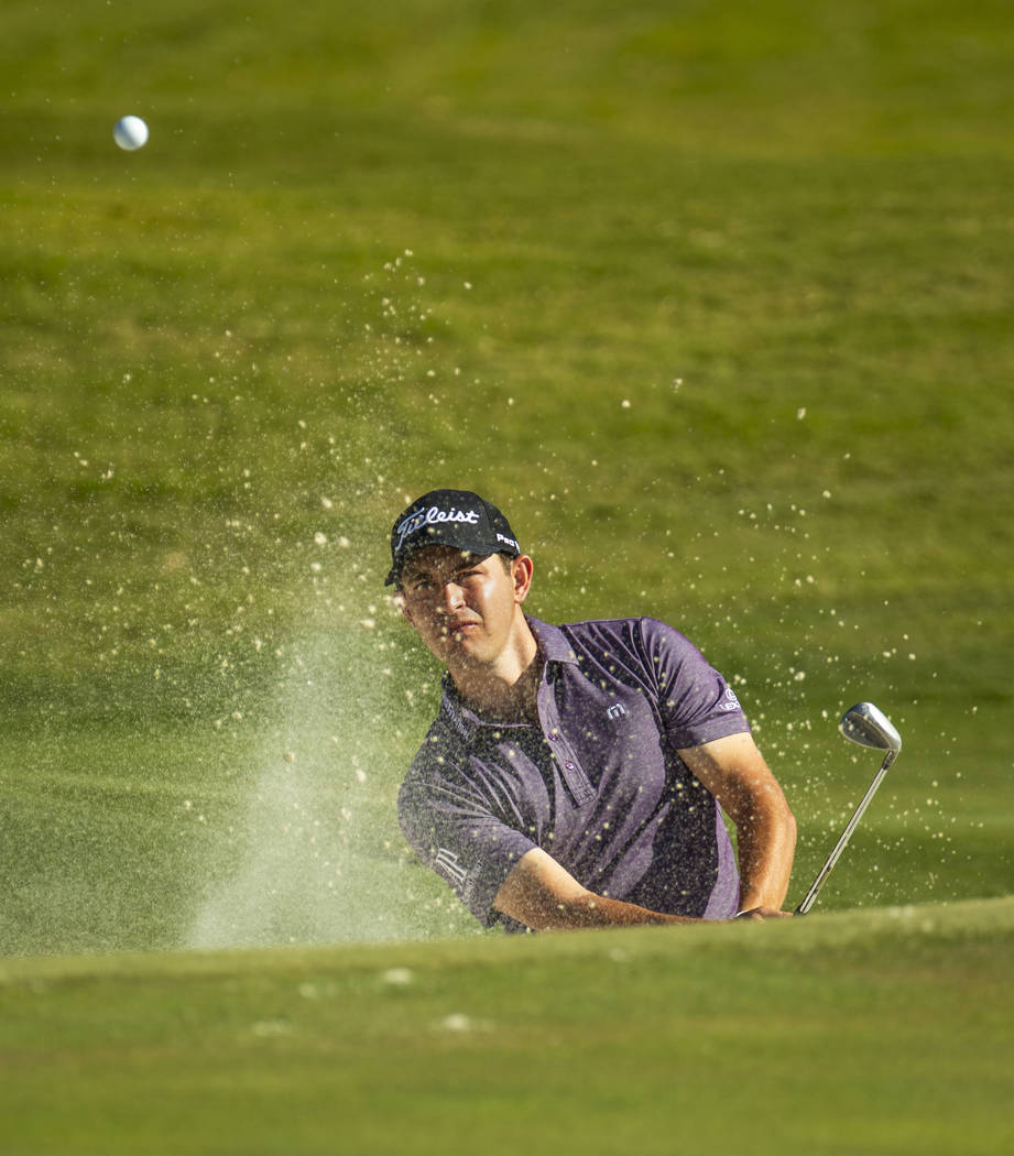 Patrick Cantlay digs out of a sand trap on hole 9 during the third round of Shriners Hospitals ...