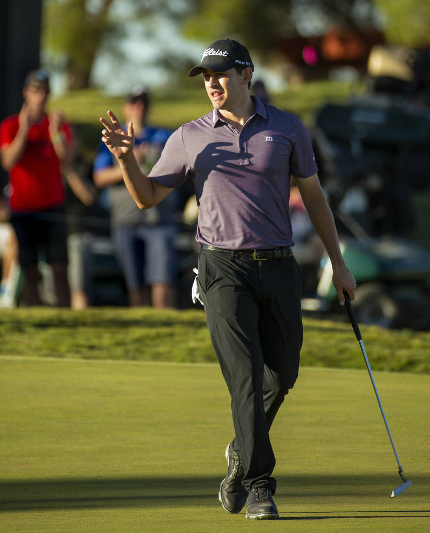 Patrick Cantlay waves to the gallery after sinking a putt on hole 18 during the third round of ...