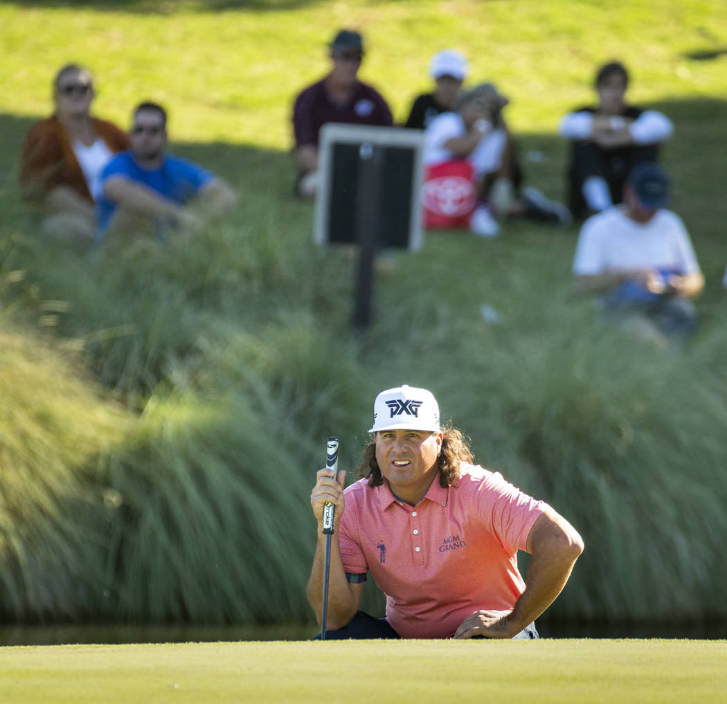 Pat Perez eyes the cup as he lines up a putt on hole 18 during the third round of Shriners Hosp ...