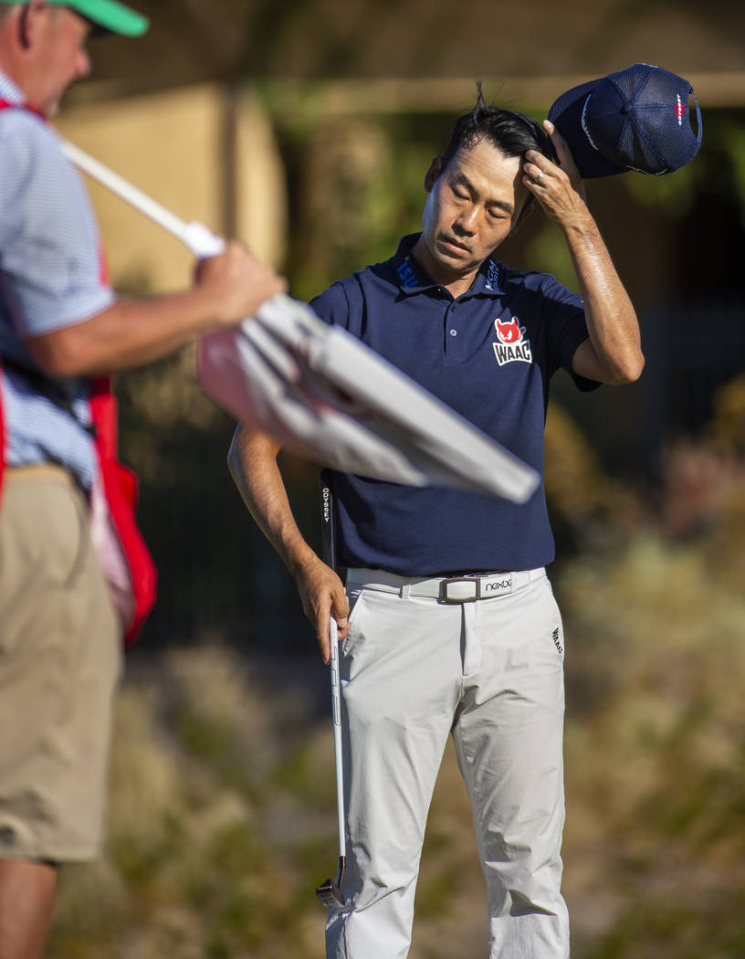 Kevin Na eyes considers his next putt on hole 15 during the third round of Shriners Hospitals f ...
