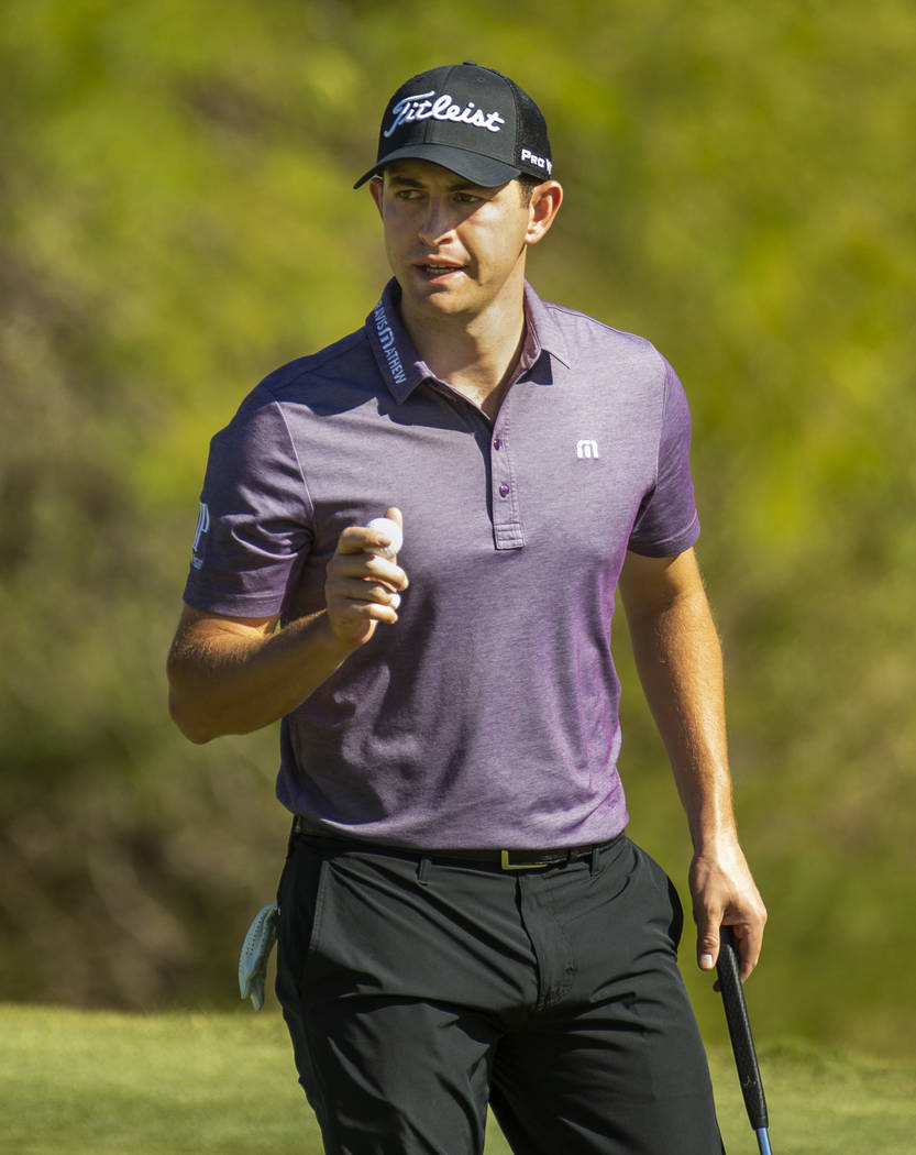 Patrick Cantlay looks to the gallery after a putt on hole 8 during the third round of Shriners ...