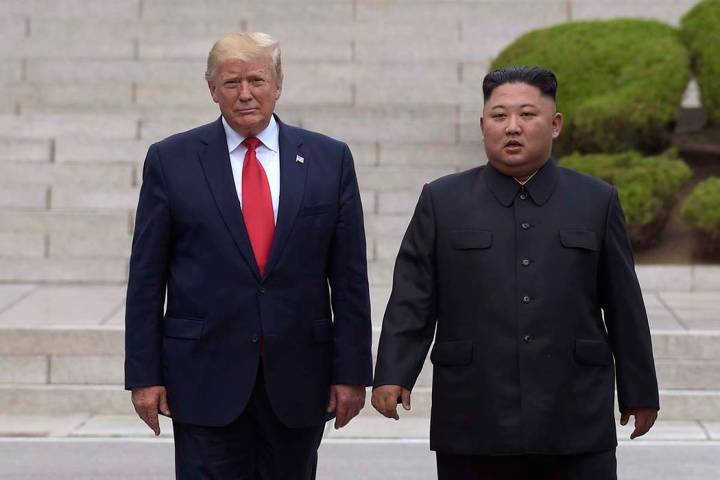 In this June 30, 2019, file photo, U.S. President Donald Trump, left, meets with North Korean l ...