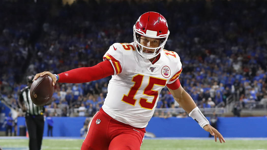 Kansas City Chiefs quarterback Patrick Mahomes (15) runs the ball against the Detroit Lions dur ...