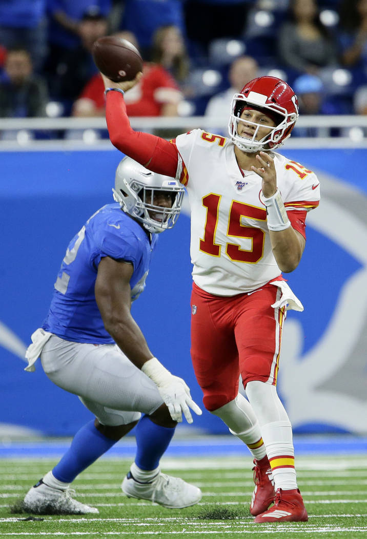 Kansas City Chiefs quarterback Patrick Mahomes (15) passes the ball against the Detroit Lions d ...