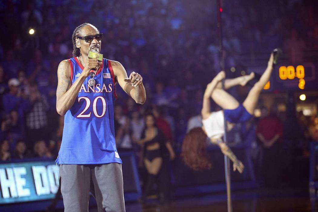 In this Friday, Oct. 4, 2019 photo, rapper Snoop Dogg performs during Late Night in the Phog, K ...