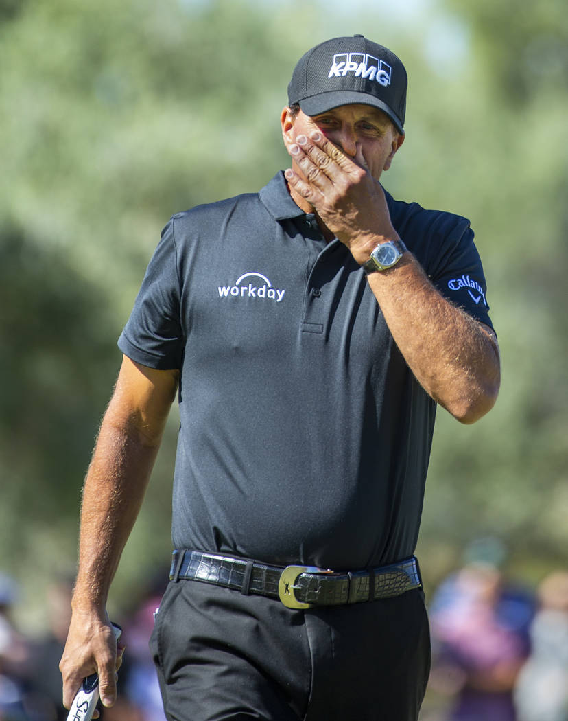 Phil Mickelson reacts to a putt on hole 1 during the third round of Shriners Hospitals for Chil ...