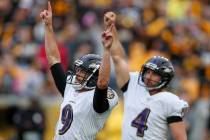Baltimore Ravens kicker Justin Tucker (9) and Sam Koch (4) celebrate after Tucker made a field ...