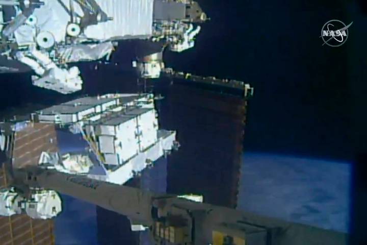 In this image made from video provided by NASA, NASA astronauts Christina Koch and Andrew Morga ...