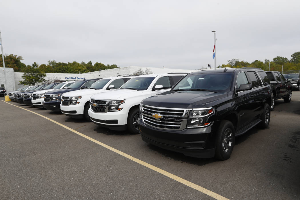 In this Monday, Sept. 30, 2019, photo a row of Chevrolet Suburban vehicles are shown at Wally E ...