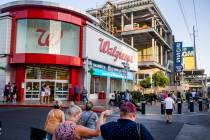 People walk by the Walgreens on the Las Vegas Strip on Tuesday, Sept. 10, 2019, in Las Vegas. ( ...