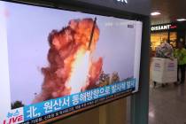 A TV screen shows a file image of a North Korea's missile launch during a news program at the S ...