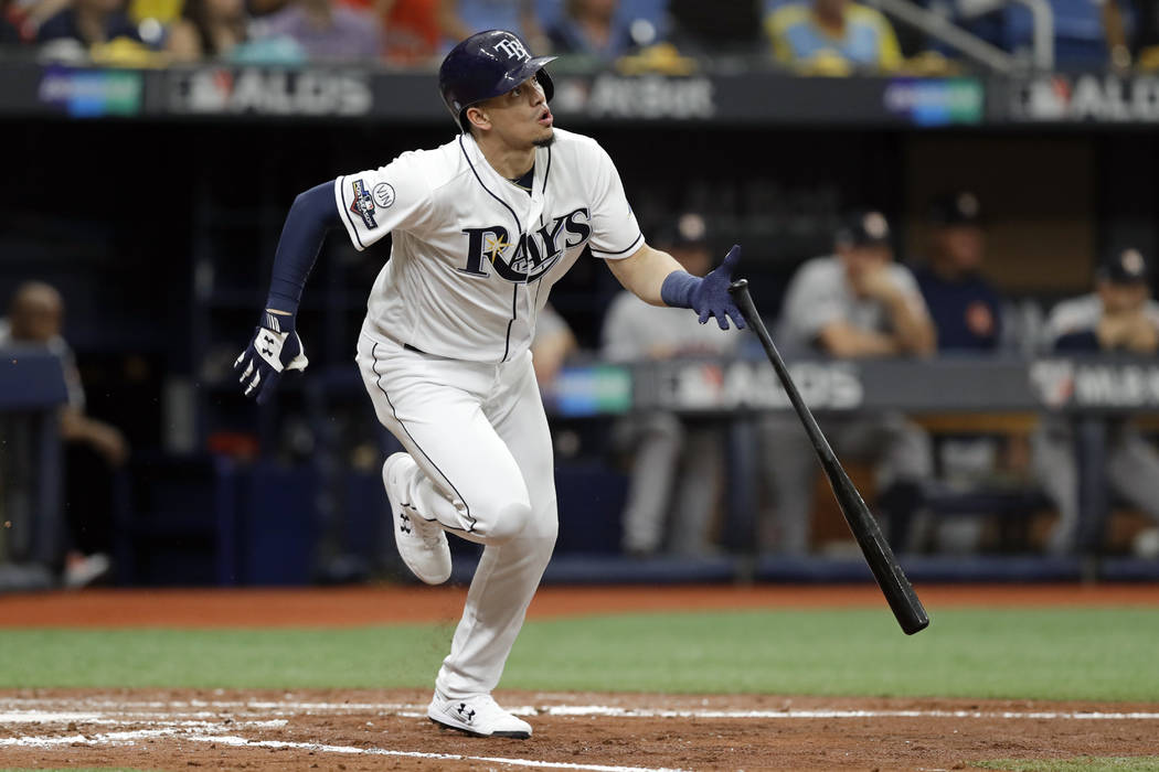 Tampa Bay Rays' Willy Adames hits a double against the Houston Astros  during the second inning …