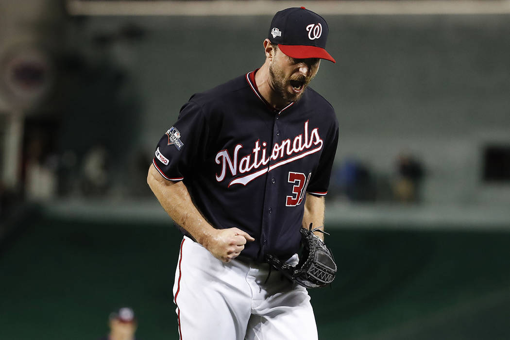 Washington Nationals starting pitcher Max Scherzer (31) reacts after  striking out Los Angeles D …