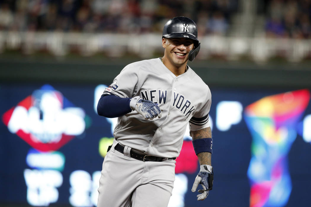 New York Yankees' Gleyber Torres celebrates as he runs the bases after hitting a home run durin ...