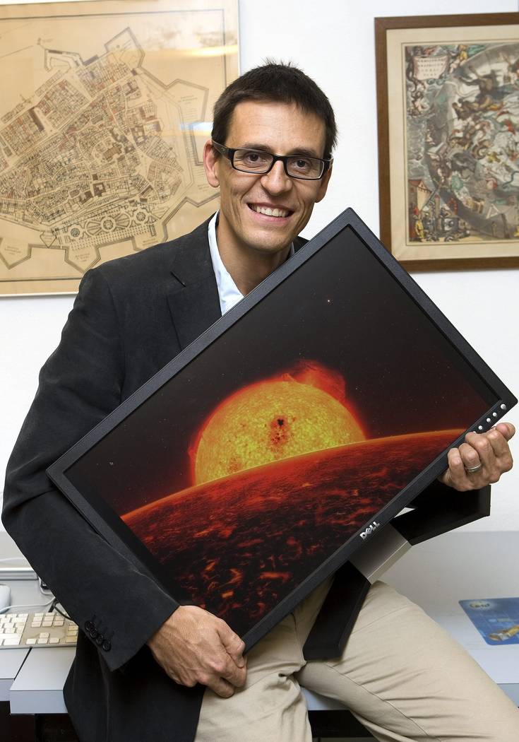 FILE - In this Wednesday, Sept. 16, 2009 file photo Swiss astrophysicist Didier Queloz poses fo ...