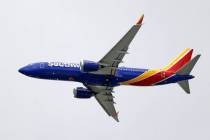 In a March 13, 2019, file photo, a Southwest Airlines Boeing 737 Max 8 jet flies over Mesa, Ari ...