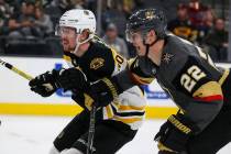 Boston Bruins center Joakim Nordstrom (20) and Vegas Golden Knights defenseman Nick Holden (22) ...