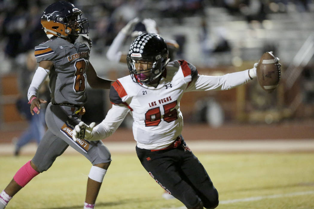 Las Vegas' Christian Flores (85) scores a touchdown  during the fourth quarter of a football ...
