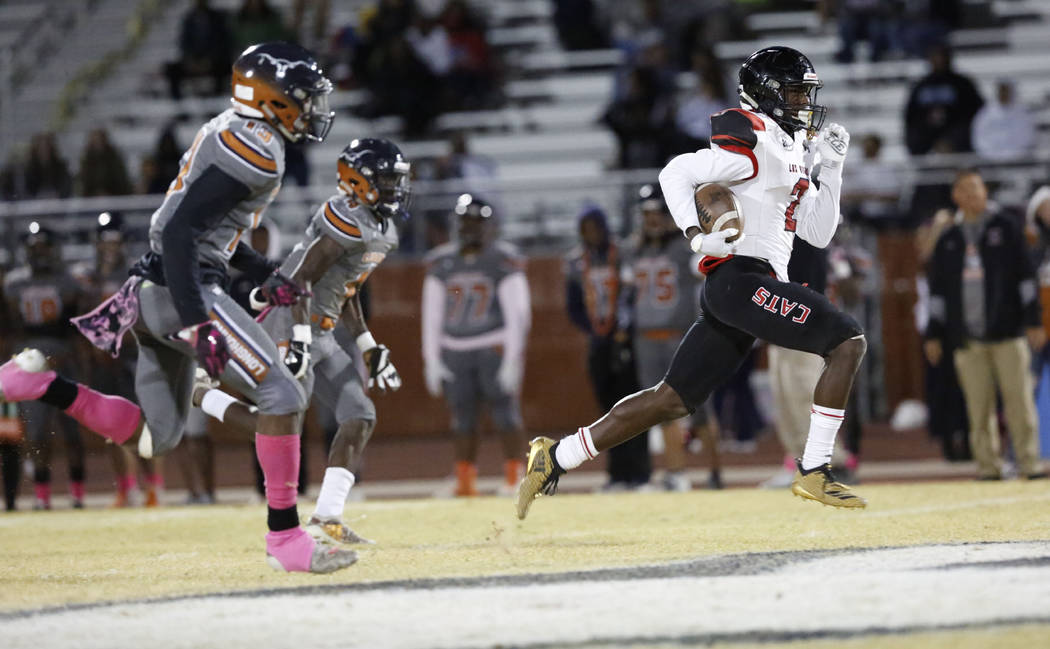 Las Vegas' Miles Davis (2) runs to the corner to score a touchdown during the fourth quarter of ...