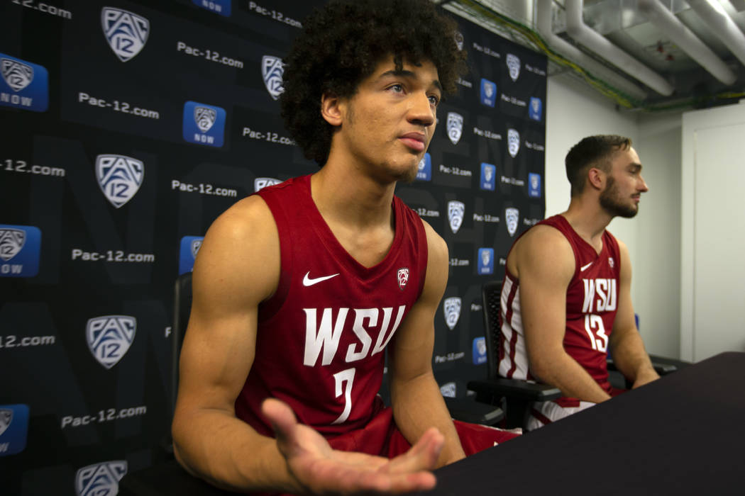 Washington State's CJ Elleby, left, and Jeff Pollard speak during the Pac-12 NCAA college baske ...