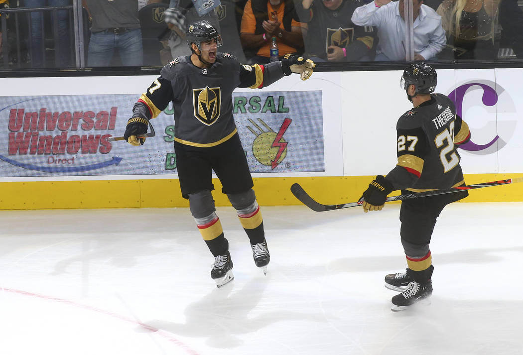 Golden Knights' Max Pacioretty (67) celebrates his goal with Shea Theodore (27) during the thir ...