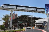 The Las Vegas Monorail runs past the Las Vegas Convention Center expansion on Tuesday, July 9, ...