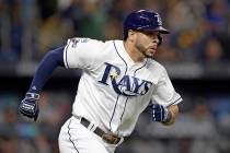 Tampa Bay Rays' Tommy Pham runs the bases after hitting a home run against the Houston Astros i ...