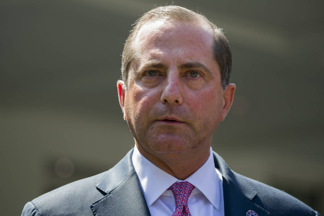 In a Sept. 11, 2019, file photo, Health and Human Services Secretary Alex Azar speaks with repo ...
