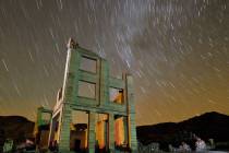 Ruins of the Cook Bank building in Rhyolite, Nev., are shown in this time exposure beneath a ce ...