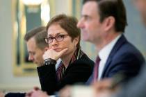 In a March 6, 2019, file photo, then U.S. Ambassador to Ukraine Marie Yovanovitch, center, sits ...