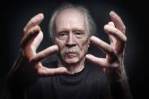 Director and composer John Carpenter performed some of his iconic movie scores live with a five ...