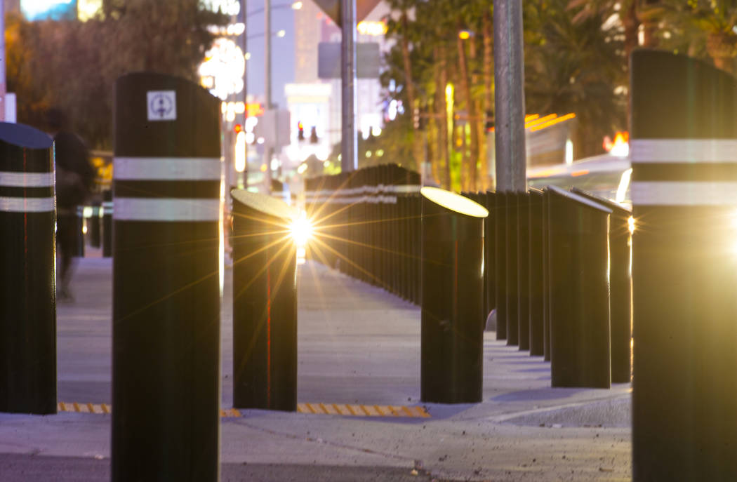 Various sizes of bollards are seen near an exit onto Las Vegas Boulevard South, just up from t ...