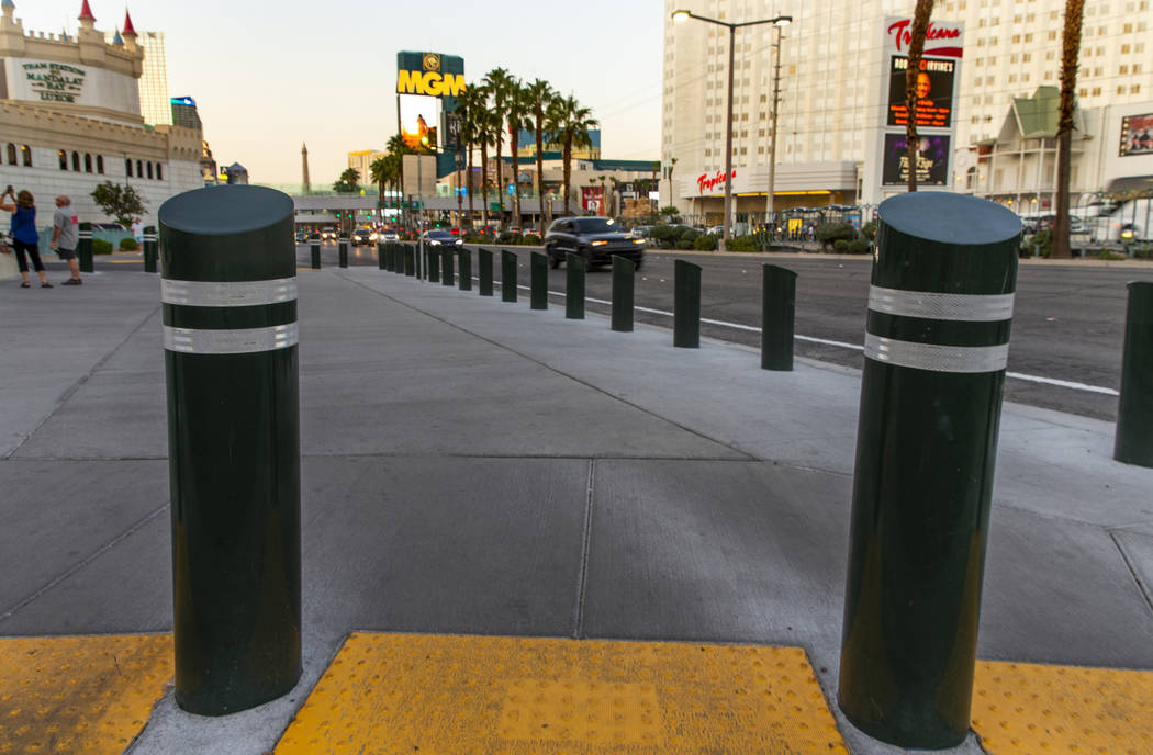 Various sizes of bollards are seen near an exit onto Las Vegas Boulevard South at the Excalibur ...