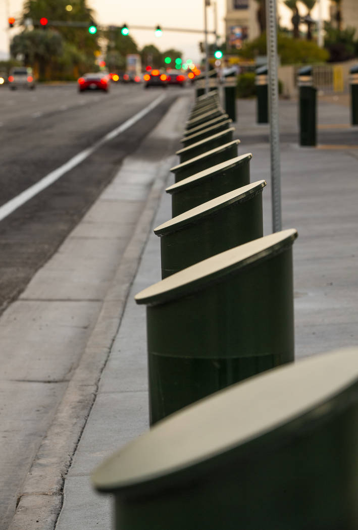 A shortened row of bollards are seen near an exit onto Las Vegas Boulevard South at the Excalib ...