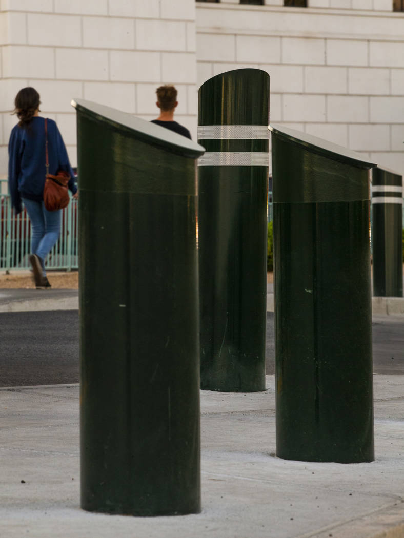 Various sizes of bollards are seen near an exit onto Las Vegas Boulevard South at the Excalib ...