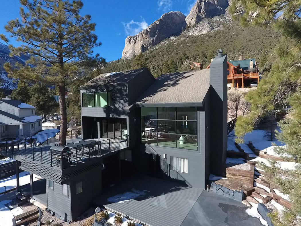 The three-level cabin is at a high elevation on the mountain. (Mount Charleston Realty Inc.)