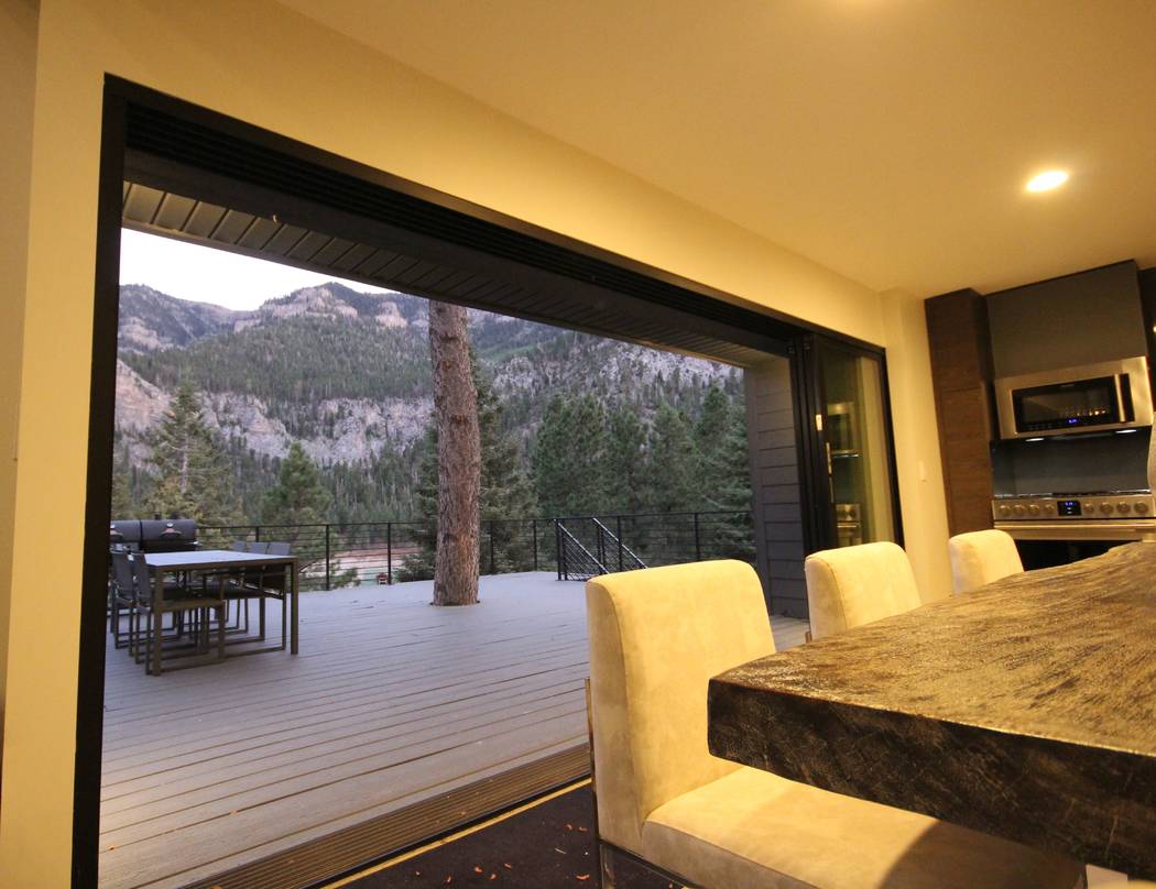The cabin features indoor-outdoor living features. (Mount Charleston Realty Inc.)