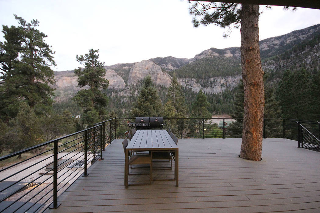 The deck has views of the pine forest. (Mount Charleston Realty Inc.)