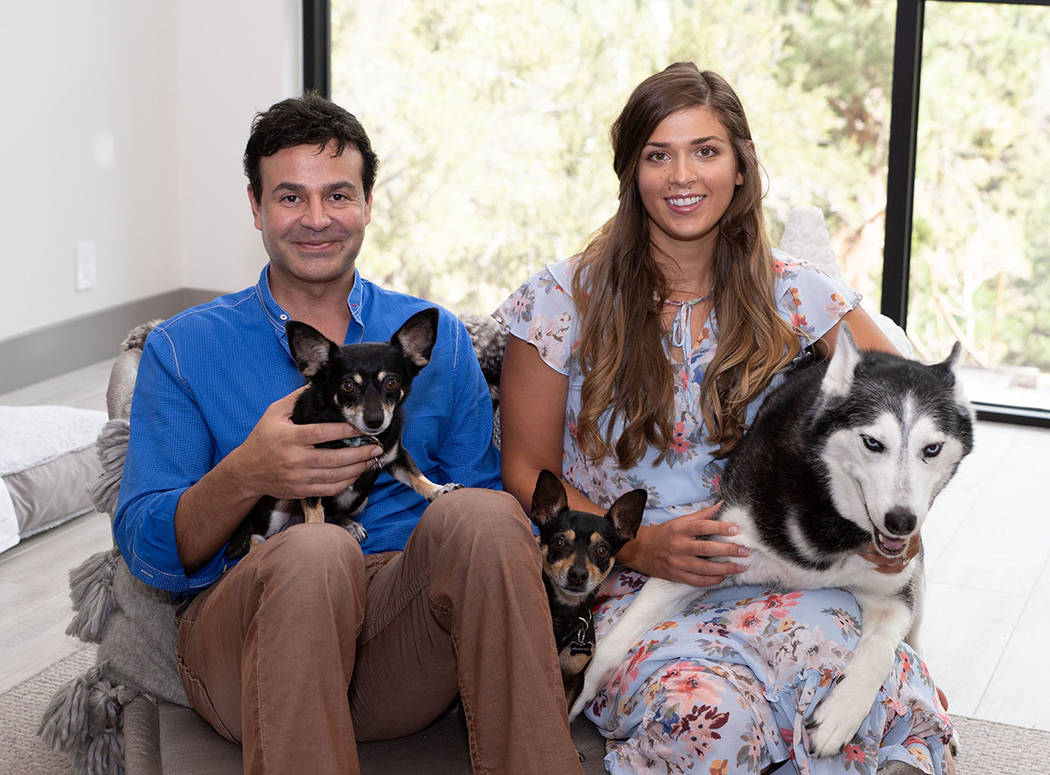 Amanda and Nick Toors with their dogs Rani, Pico and Marina. (Tonya Harvey/Real Estate Millions)