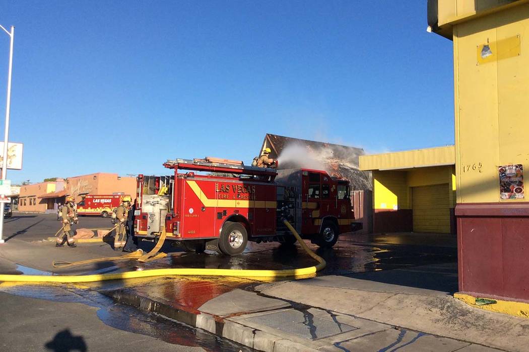 Las Vegas Fire Department crews put out a fire at a vacant restaurant at 1755 E. Charleston Blv ...