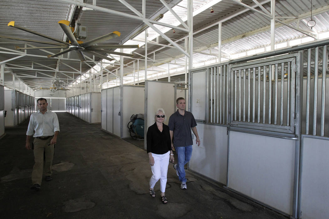 Wayne Newton's former stables are shown in a Aug. 27, 2013. From left is project manager John M ...