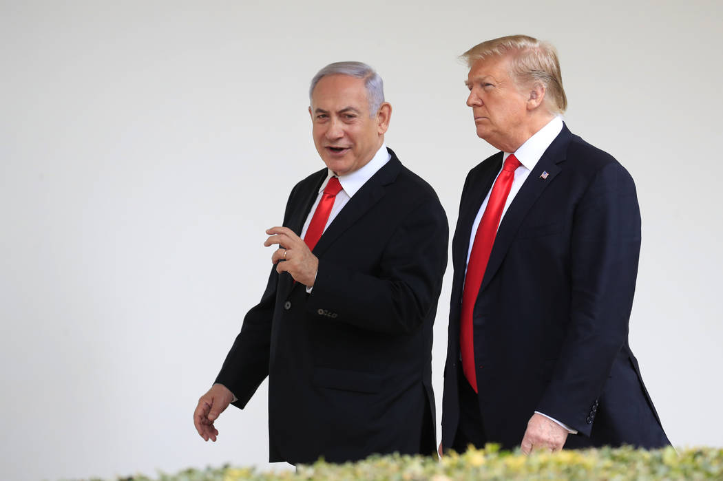 FIn a March 25, 2019, file photo, President Donald Trump and visiting Israeli Prime Minister Be ...