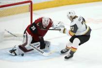 Arizona Coyotes goaltender Darcy Kuemper (35) makes a save on a breakaway shot by Vegas Golden ...