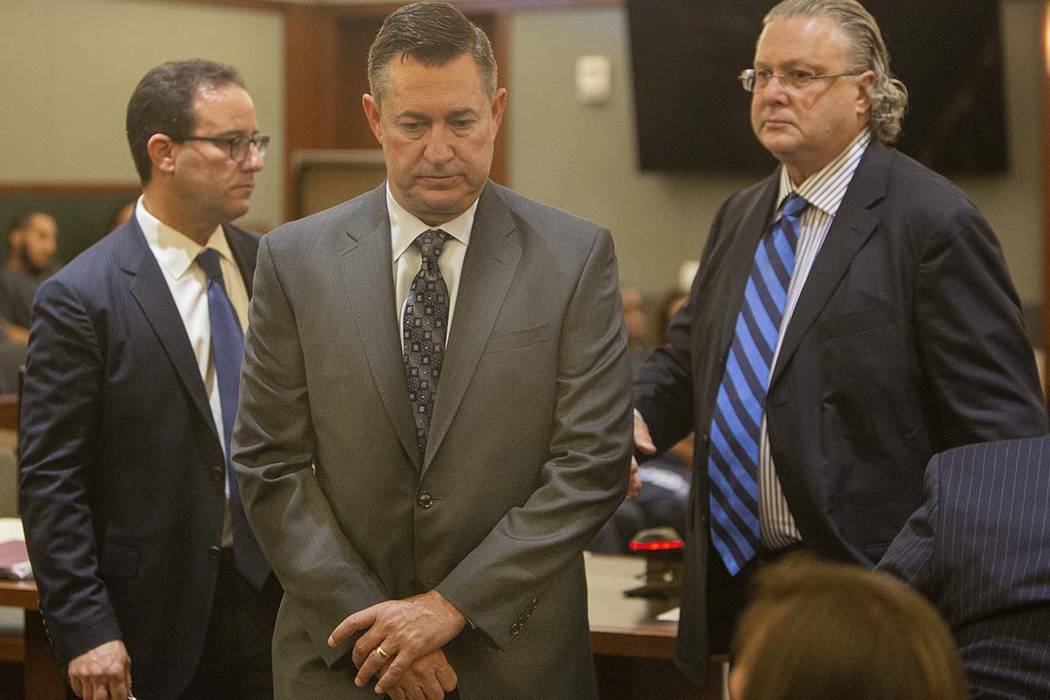 Scott Gragson, center, walks out of court with his attorneys, Richard Schonfeld, left, and Davi ...