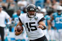 Jacksonville Jaguars quarterback Gardner Minshew (15) runs against the Carolina Panthers during ...